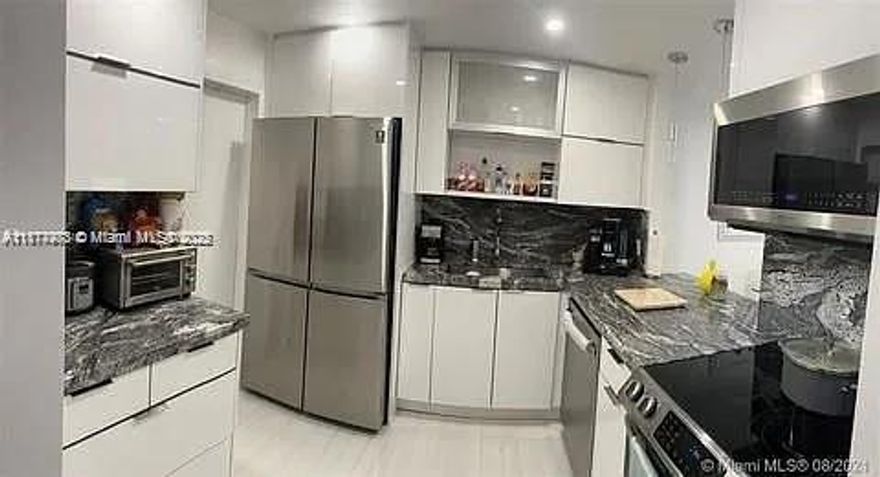 Beautiful 1 bedroom, 1 full bath and half bath for guests. Unit was recently remodeled. Very modern with many extras including: tv wall wrapped with stone and electric fireplace installed. Modern bathrooms and kitchen with Samsung stainless steel appliances all brand new including: Fridge, Stove/oven, and dishwasher. The floors are a beautiful touch to the unit making it very modern. Full size closet with built-in. Right across/Steps from Hallandale Beach. Very close to Restaurants, shopping plazas, grocery stores and more! Aventura mall, Gulf Stream, Hard Rock casino all mins away!!! Great night entertainment close by! Hollywood Boardwalk also mins away.
