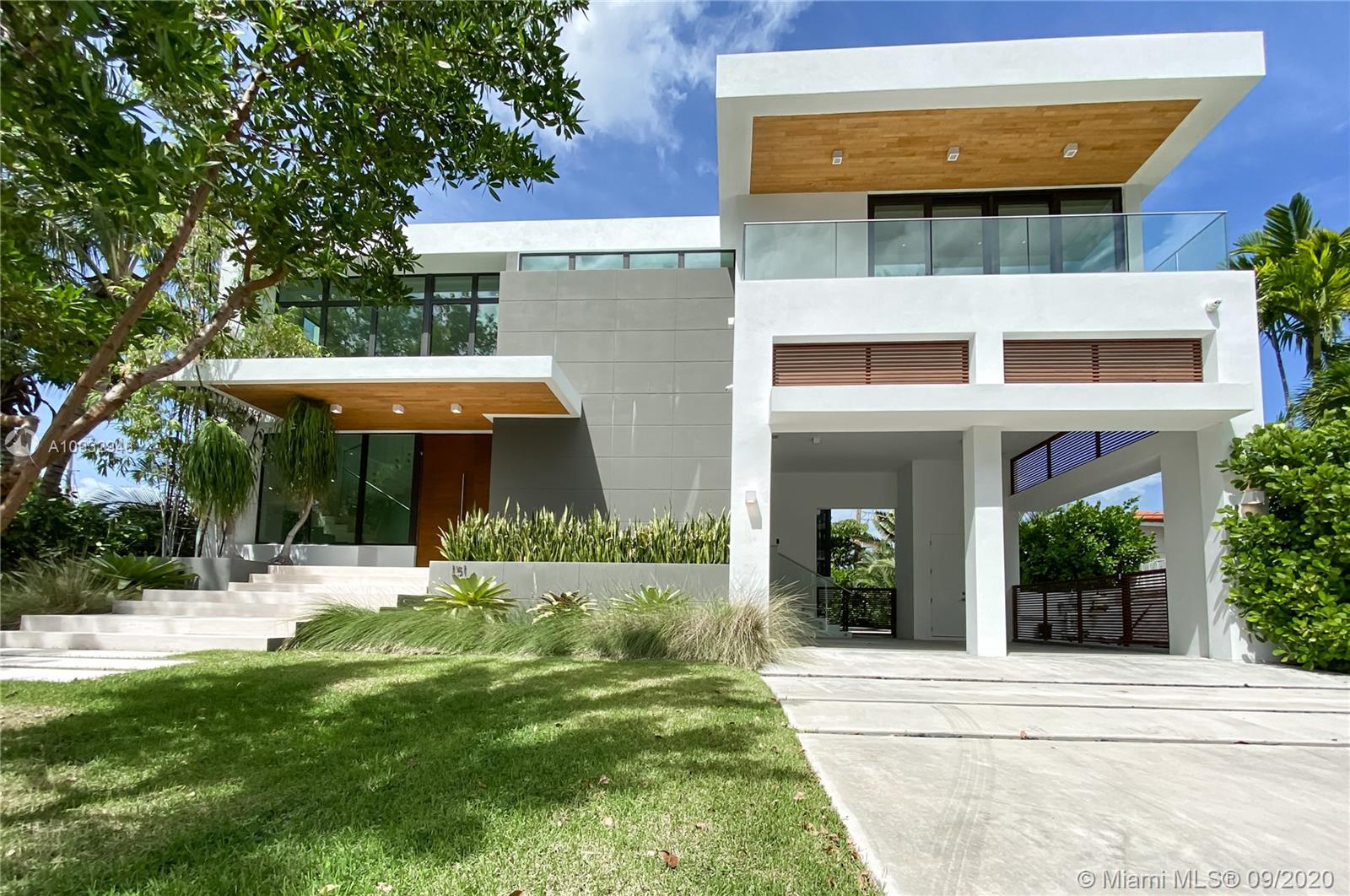 New construction (2017) home offering 3,817 SF, 5 beds and 7 baths. This custom-built modern property comes with high ceilings, top-of-the-line finishes, lots of natural light and limestone & hard wood flooring. The Ornare kitchen features Wolf, Sub-Zero & Miele appliances and a cozy breakfast nook. The master offers a walk-in closet and a spacious master bath with a shower & tub. Sliding doors open up from the living room to the garden, which is ideal for entertaining and features a pool w/ salt-enabled water treatment, a large terrace, a summer kitchen and separate bathroom. Additional features include 3 ACs (Trane) with low energy consumption. 2 Wi-fi controlled water heaters, a private Sun terrace, office space & 2 covered parking spaces. This 10/10 Construction can be sold furnished.