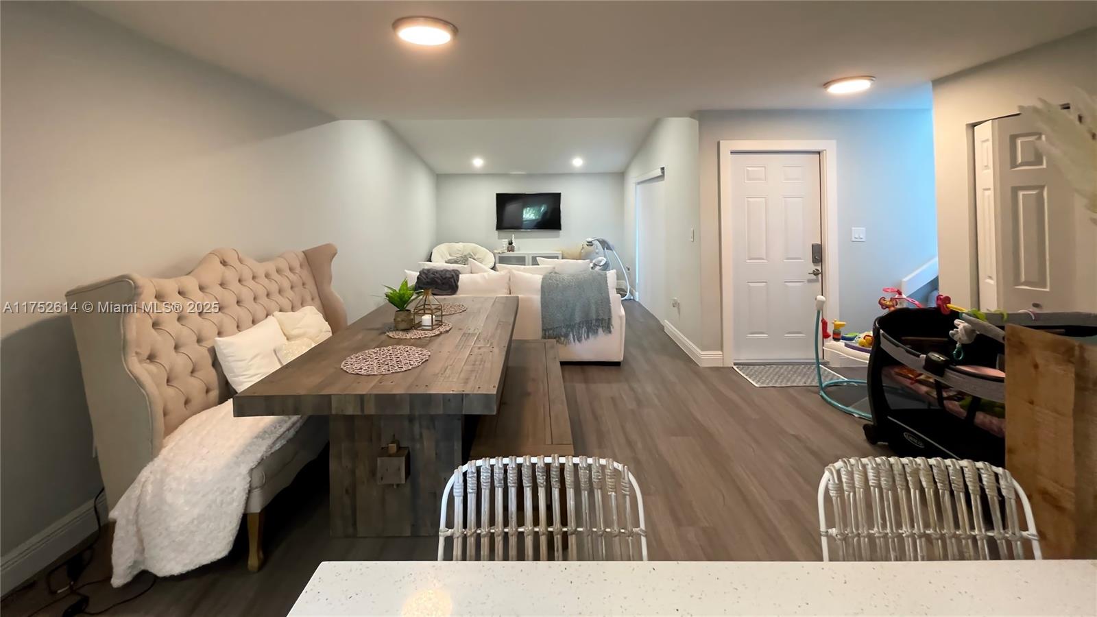 Beautifully remodeled 3-bedroom, 2-bathroom townhouse in the highly sought-after, guard-gated Snapper Creek Townhouses Community. This charming home boasts a stylish blend of ceramic and wood flooring, a spacious master bedroom with a walk-in closet, sleek zebra shades, and impact-resistant windows and doors for added security and peace of mind. Relax on the inviting front porch or entertain in the covered patio. Enjoy resort-style amenities, including a community pool, clubhouse, and basketball courts. A must-see gem! Easy to show.