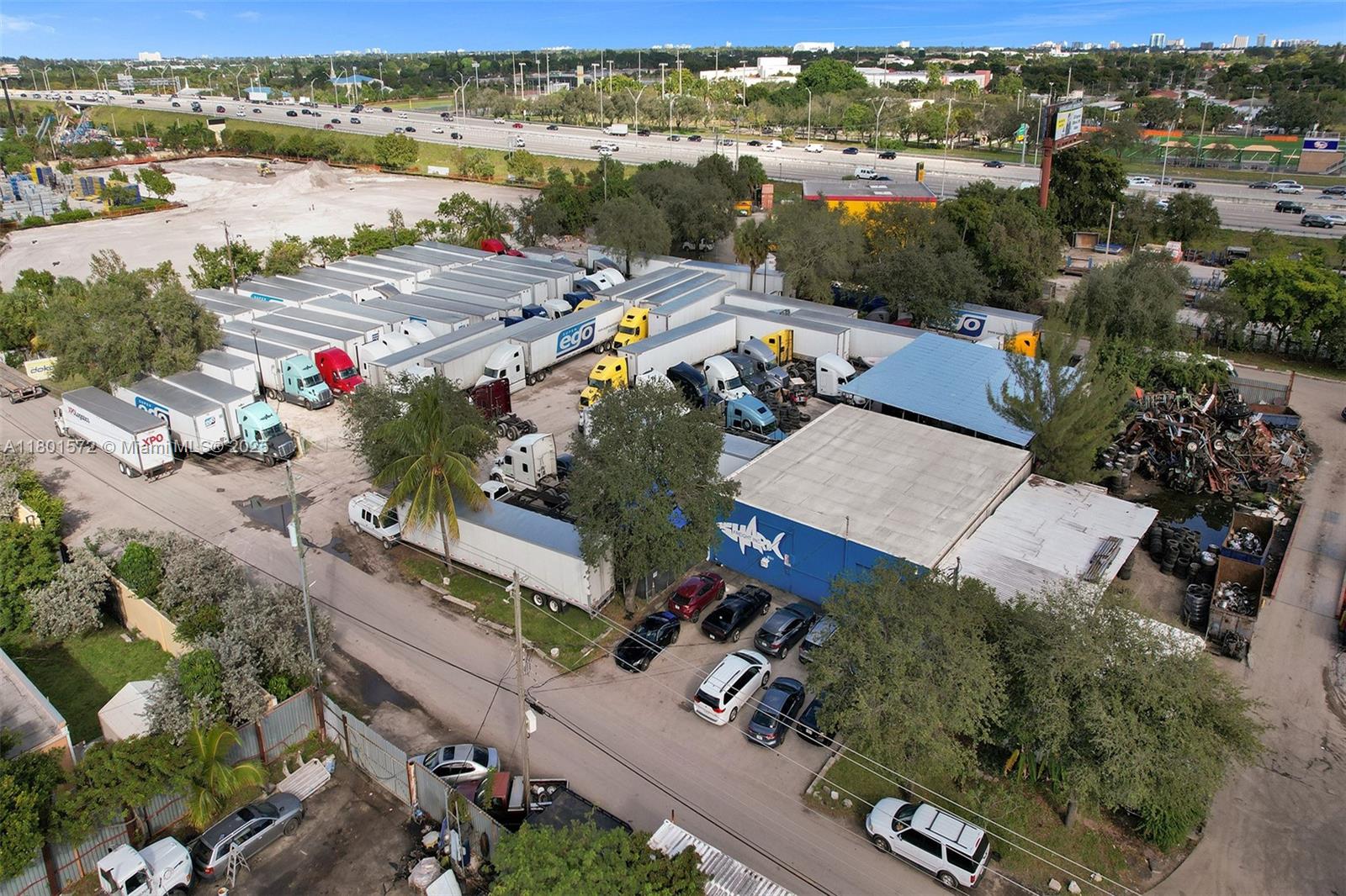 Large 1.5-acre industrial lot, featuring a 3,000 square foot warehouse with ample space for truck/heavy machinery parking and storage. The property also features an office space, along with additional space for parking out front. Conveniently located right next to I-95.