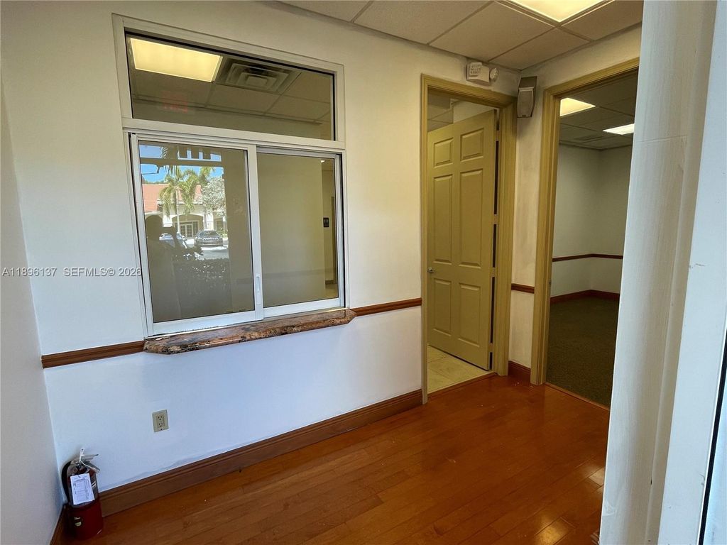 Photo of 5501 N University Dr #103, Coral Springs, FL 33067 (MLS # A11896137)