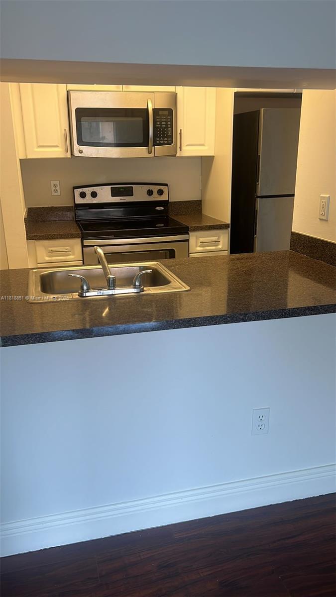 9808 Hammocks Blvd 203-23
