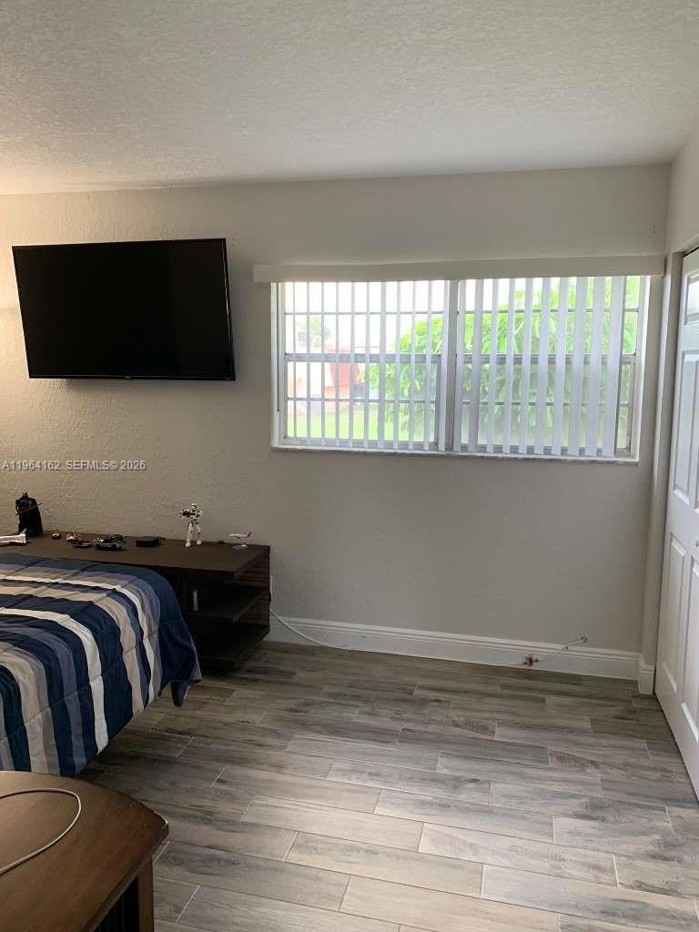 TOWN & COUNTRY CONDO PHAS - Residential Lease