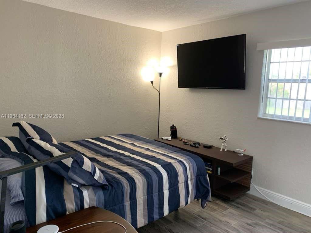 TOWN & COUNTRY CONDO PHAS - Residential Lease
