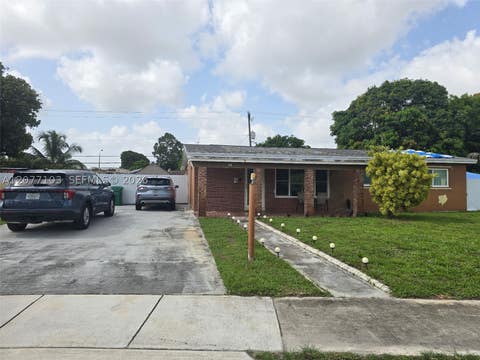Photo of 1225 NW 192nd St, Miami Gardens, FL 33169 (MLS # A12077103)