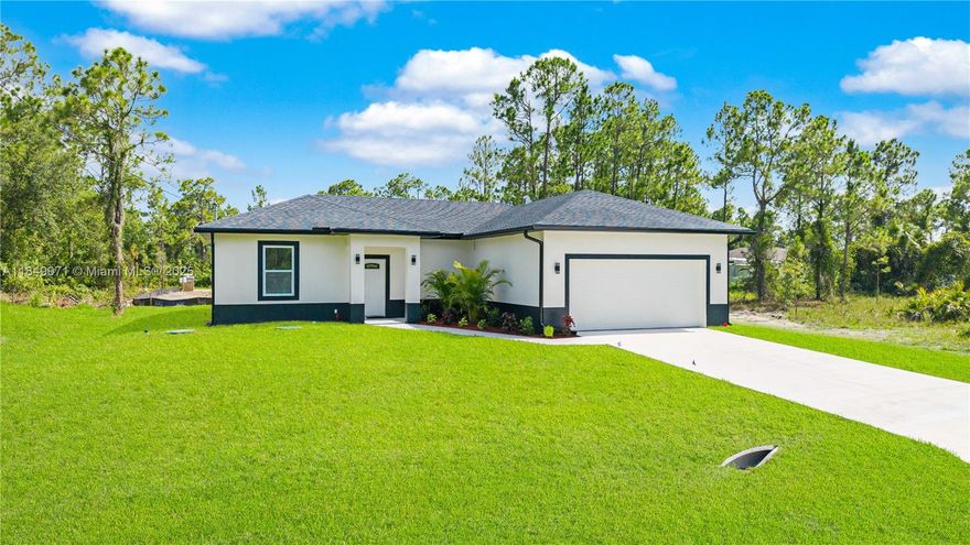 Brand New Home in a Highly Desirable Area of Lehigh Acres

Welcome to your dream home, located in one of the most sought-after neighborhoods in Lehigh Acres—just minutes from Highway 82 for easy access. This stunning new construction features impact windows and doors, an open-concept layout, and a split floor plan for added privacy and functionality.

The spacious kitchen is a chef’s delight, complete with white shaker cabinets, quartz countertops and brand-new SS appliances. A dedicated laundry room adds convenience and extra storage.

Large sliding glass doors open to a beautiful backyard—perfect for enjoying Florida’s year-round sunshine. The master suite offers a luxurious retreat with a modern walk-in shower, and the expansive backyard has plenty of room to add a pool.