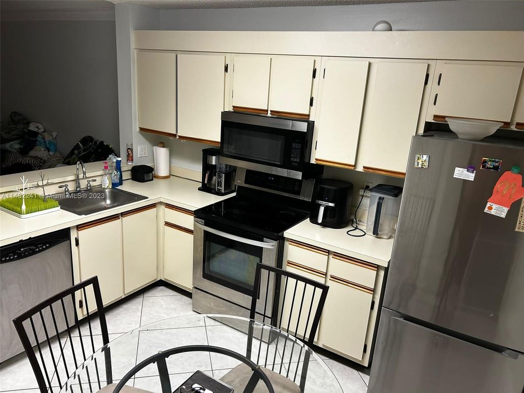 Photo of 5741 Riverside Dr #203A5, Coral Springs, FL 33067 (MLS # A11482241)