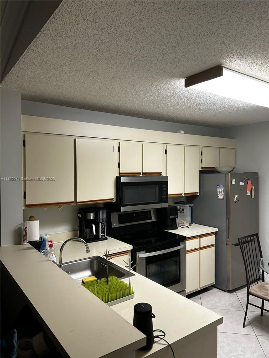 Photo of 5741 Riverside Dr #203A5, Coral Springs, FL 33067 (MLS # A11482241)