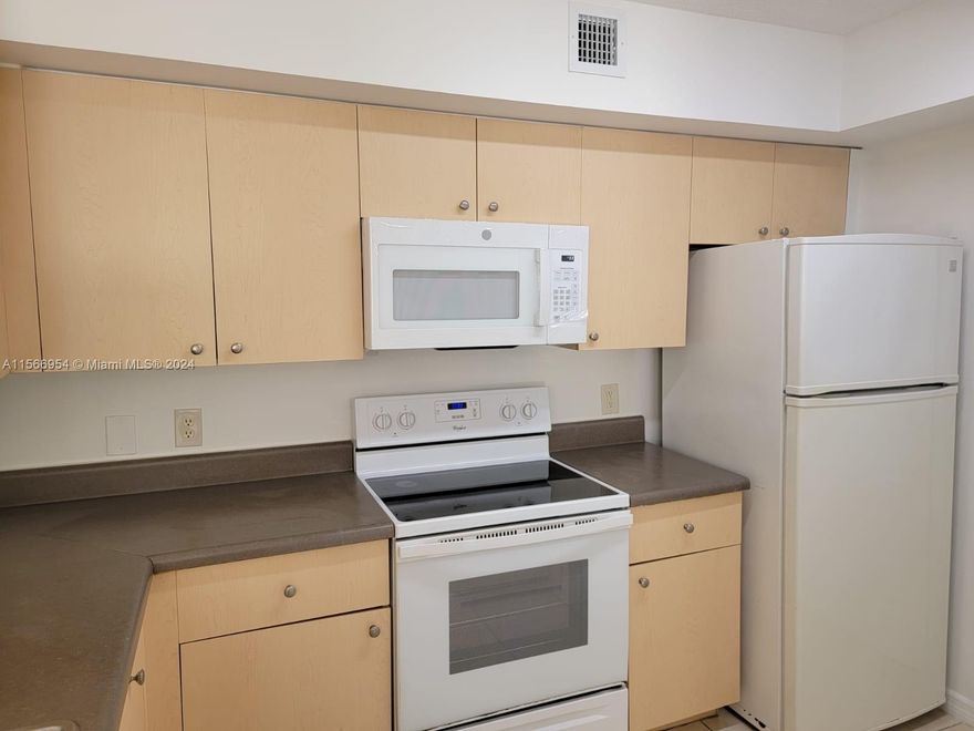 Immaculate Aventine at Miramar condo! This spacious 2-bed, 2-bath unit features tile throughout, a relaxing porch. The community boasts modern amenities, beautifully maintained common areas, and association coverage for water and cable. With convenient access to Miami-Dade and Broward Counties via the Turnpike and I-75, you'll enjoy proximity to dining, entertainment, and shopping. Pembroke Lakes Mall, the Shops at Pembroke Gardens, and Sawgrass Mall are just minutes away. Aventine offers outstanding amenities, including 2 pools, a jacuzzi, 3 playgrounds, barbecue grills, basic cable service.