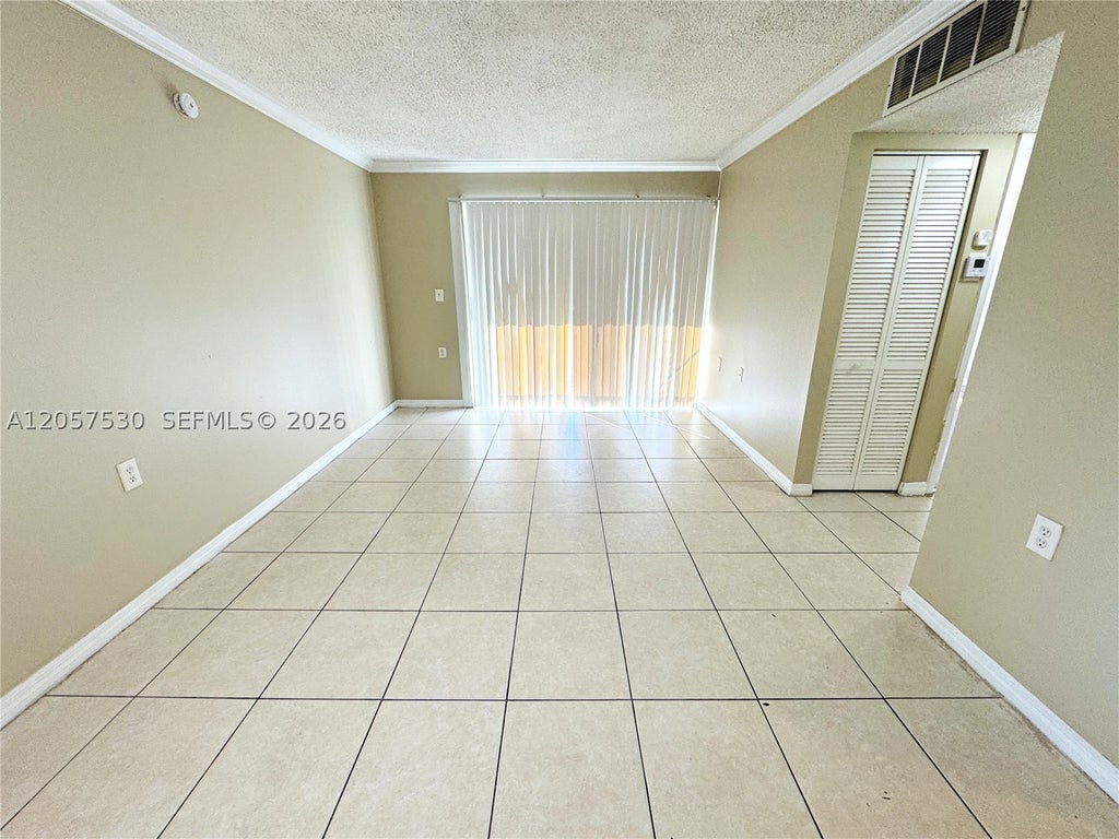 Photo of 1141 Lake Victoria Dr #E, West Palm Beach, FL 33411 (MLS # A12057530)
