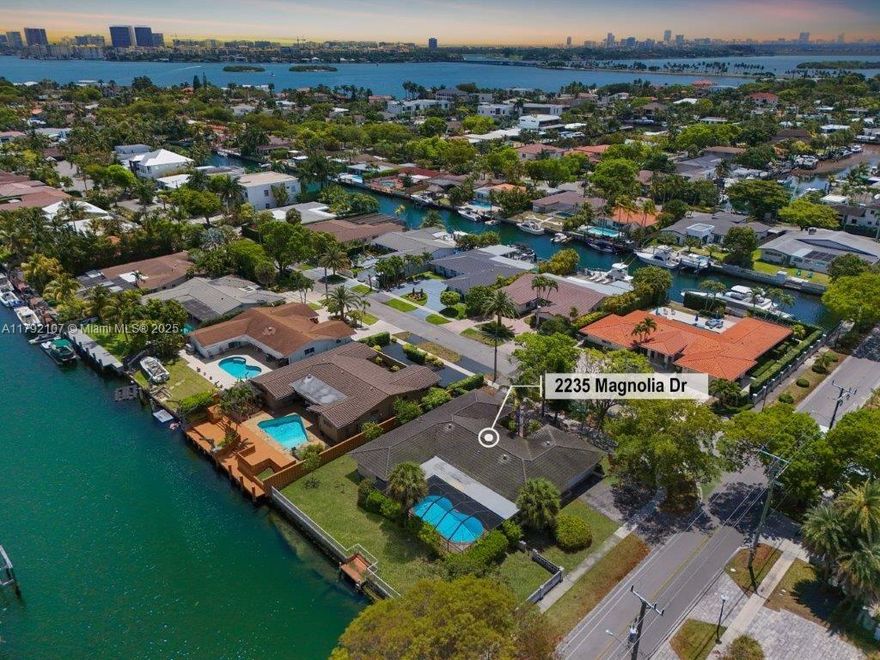 24-hour guard-gated community of Keystone Point, this rare waterfront opportunity offers 106 feet of deep water frontage on a wide, ocean-access canal—with no bridges to bay. Perfectly positioned on a generous 12,000 SF corner lot (106’ x 112’) this property invites you to renovate the existing 4-bed, 3-bath home or build your dream Miami waterfront escape on the LARGEST LOT currently for sale in Keystone. Offered at land value, the near-original residence features a 2-car garage, pool, expansive covered patio, and ample outdoor space ideal for entertaining. Whether you're looking to create a NEW modern retreat or a luxurious tropical oasis, this lot offers limitless potential. Located just minutes from Bal Harbor, world-class shopping, fine dining, and the beaches. Floor plan available.