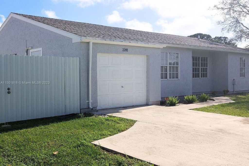 Photo of 2293 SE Berkshire Blvd, Port Saint Lucie, FL 34952 (MLS # A11501816)