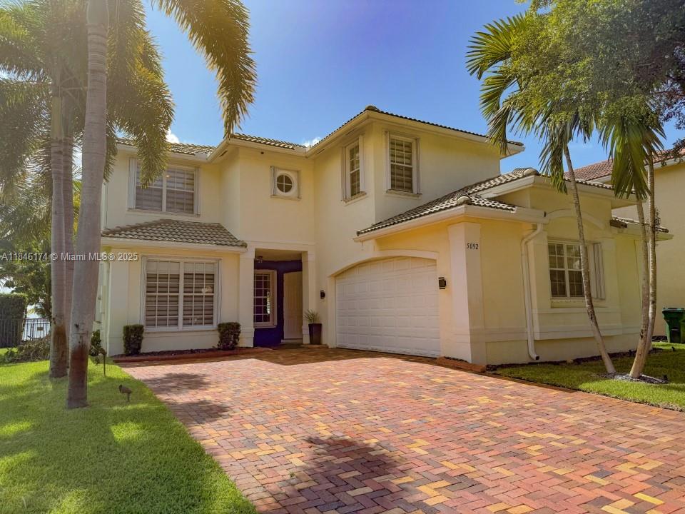 Experience luxury & comfort in this stunning lakefront home! 4 bedrooms, 3 full bathrooms, a private pool, & breathtaking sunset views. European-style Gola kitchen, quartz countertops, walk-in pantry, & elegant finishes. Expansive primary suite + office, his and hers bathroom, walk-in closets, & a sunset-view balcony. 1 bedroom and a full bath on ground floor. Loft & laundry room upstairs. Spanish porcelain tile floors, high ceilings, wood-accented walls, accordion shutters, & 2 A/C units. Automated blinds downstairs. Fenced backyard with covered patio, misting system, garden lights, & fruit trees. Extra refrigerator in the garage. Driveway fits up to 5 cars. Sunset Falls gated community with tennis/basketball cts, gym, playground, & pool. Privacy, style, & sophistication all in one place!