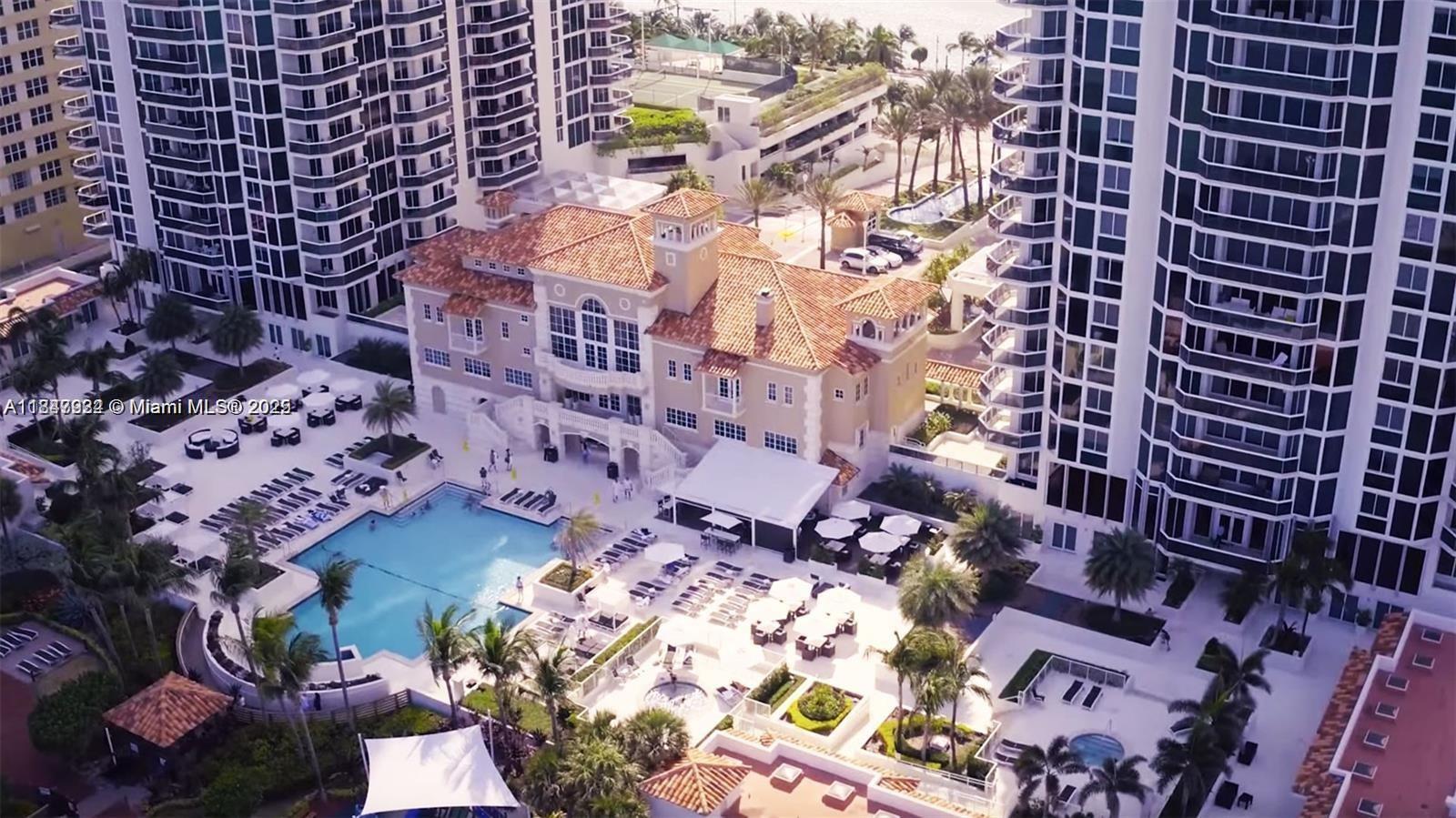 Spectacular High-Floor Unit with Unobstructed Ocean and City Views. Experience breathtaking, panoramic views of both the city skyline and the Atlantic Ocean from this stunning high-floor residence. Fully renovated and tastefully furnished, this unit boasts a sleek open kitchen, modern designer bathrooms, and expansive walk-in closets. Enjoy sunrise and sunset vistas from both bedrooms, each offering floor-to-ceiling windows that frame the views beautifully. Located in a premier five-star resort-style community, residents enjoy world-class amenities including a tennis court, expansive pool, state-of-the-art gym, full-service spa, poolside café, and direct beach access. A true luxury lifestyle awaits. Available from October-July for a minimum of 6 months.