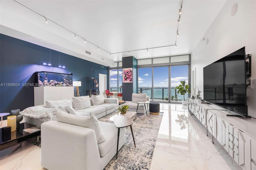 PH-4002 is an expansive and highly desirable waterfront penthouse at Icon Bay, offering approximately 2,346 square feet of interior living space with four bedrooms plus a service room, four full bathrooms, and a generous 324-square-foot terrace (See floor plans).  Perched high above Biscayne Bay, the residence enjoys unobstructed, panoramic water views and true penthouse privacy.

Located in Edgewater, one of Miami’s fastest-growing and most sought-after neighborhoods, the property sits just one block from Whole Foods Market and offers effortless access to Wynwood, the Miami Design District, Midtown Miami, and Brickell.

This waterfront penthouse, priced at approximately $1,000 per square foot, combines exceptional value with a peaceful residential atmosphere, making it ideal for luxury urban living without sacrificing serenity.