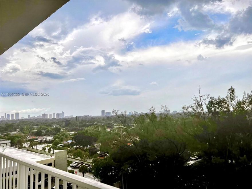 Priced to sell! Spacious two bedroom, two bathroom corner unit offering stunning south facing views of the Brickell skyline in the serene lake by in the community. Enjoy abundant natural light throughout in a private bath. Perfect for relaxing or entertaining. Corner layout provides added privacy and an open, functional living and dining area. Located in Wilshire condo is secured entry, pool, and on-site management. Centrally located near major highways, shopping, dining in public transportation, with easy access to downtown Miami, Brickell and surrounding areas. Excellent opportunity for end-users or investors.