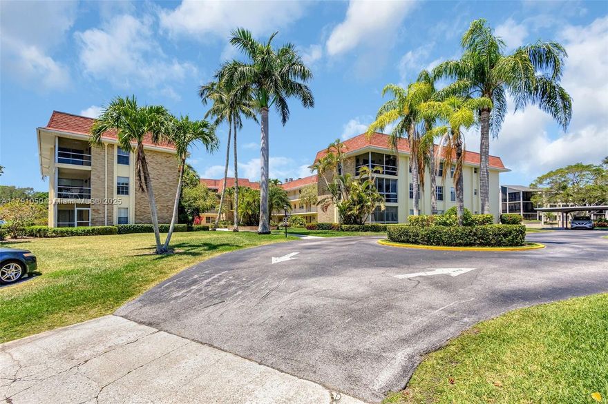 Prof. photos coming soon. Rarely available unit w/ the best wraparound water views & overlooking golf course of Ballenisle.  Largest 2/2  in a very lively 55+ community with a covered parking space #45 (very limited) & additional guest parking.  Renovated 2021. A/C & Hot Water Heater 2021. Stainless appliances 2022.  Open kitchen with new cabinets, farmhouse sink, butcher block counters and island. Luxury vinyl and partial impact glass. Enjoy tropical breezes on the oversized screened balcony w/stunning water & golf views. Building has new elevators, and new pipe lining. This 3rd-floor unit is convenient to shared laundry & new elevators. Literally steps to PGA restaurants. Close to turnpike, 95, shopping, restaurants, & beaches. Interior just painted & priced to sell.