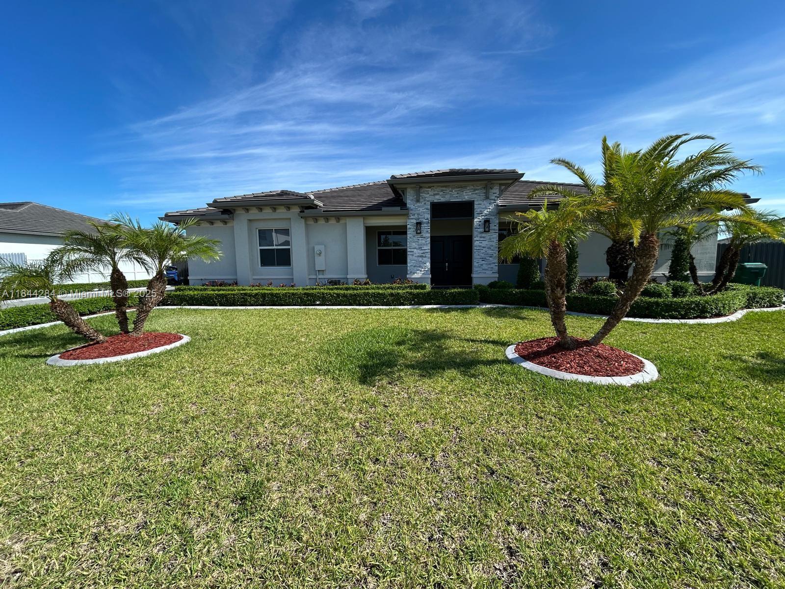 NO HOA, VACANT, ALL INCLUSIVE, new property with 3 bed and 2.5 bath in the Sedona Estates community, completed in 2023. This property was divided; our portion retains the left side and a very large patio, allowing tenants the possibility of having a boat or jet ski and additional parking for visitors. This unit features an alarm system, impact windows and doors with shutters, ceramic flooring, stainless steel appliances, a kitchen with an island and quartz countertops, and all bathrooms with showers. It is very spacious and bright. The community is very safe and quiet. Enjoy a prime location just a few blocks from Biscayne Dr and very close to US-1, Krome Ave, exit 5 of the Tpke, markets, restaurants, Baptist Homestead Hospital, the Air Reserve Base, the Speedway, and the Florida Keys.