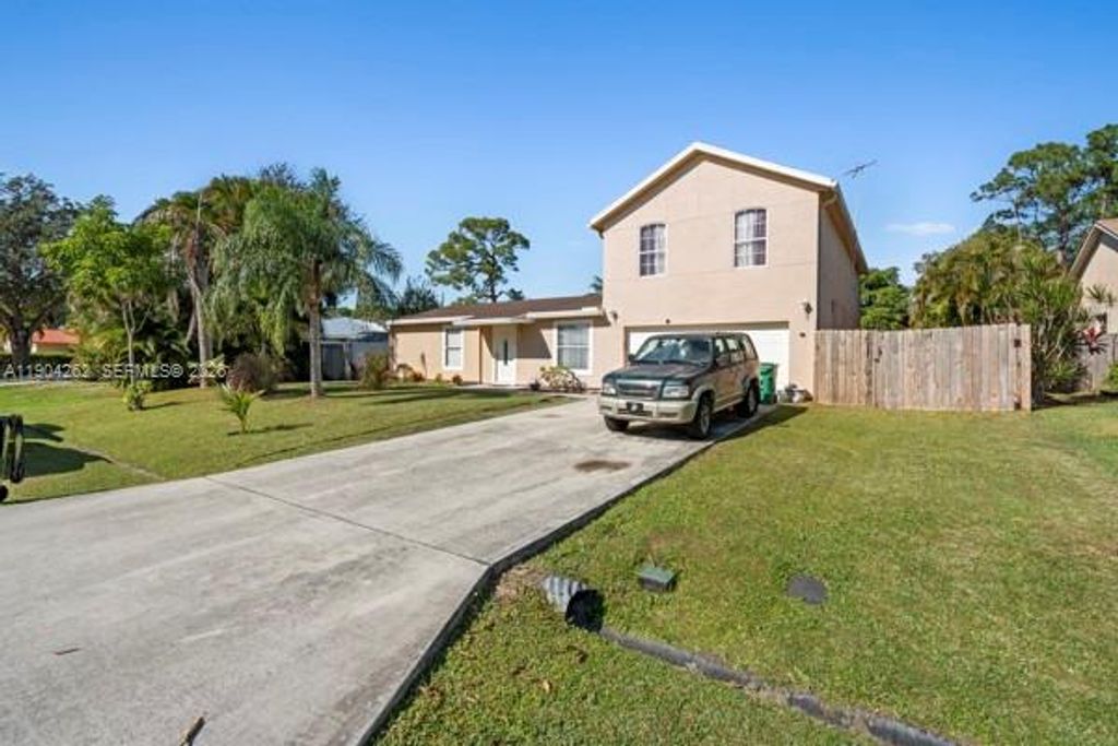 Photo of 707 SE Karrigan Ter, Port St Lucie, FL 34983 (MLS # A11904262)