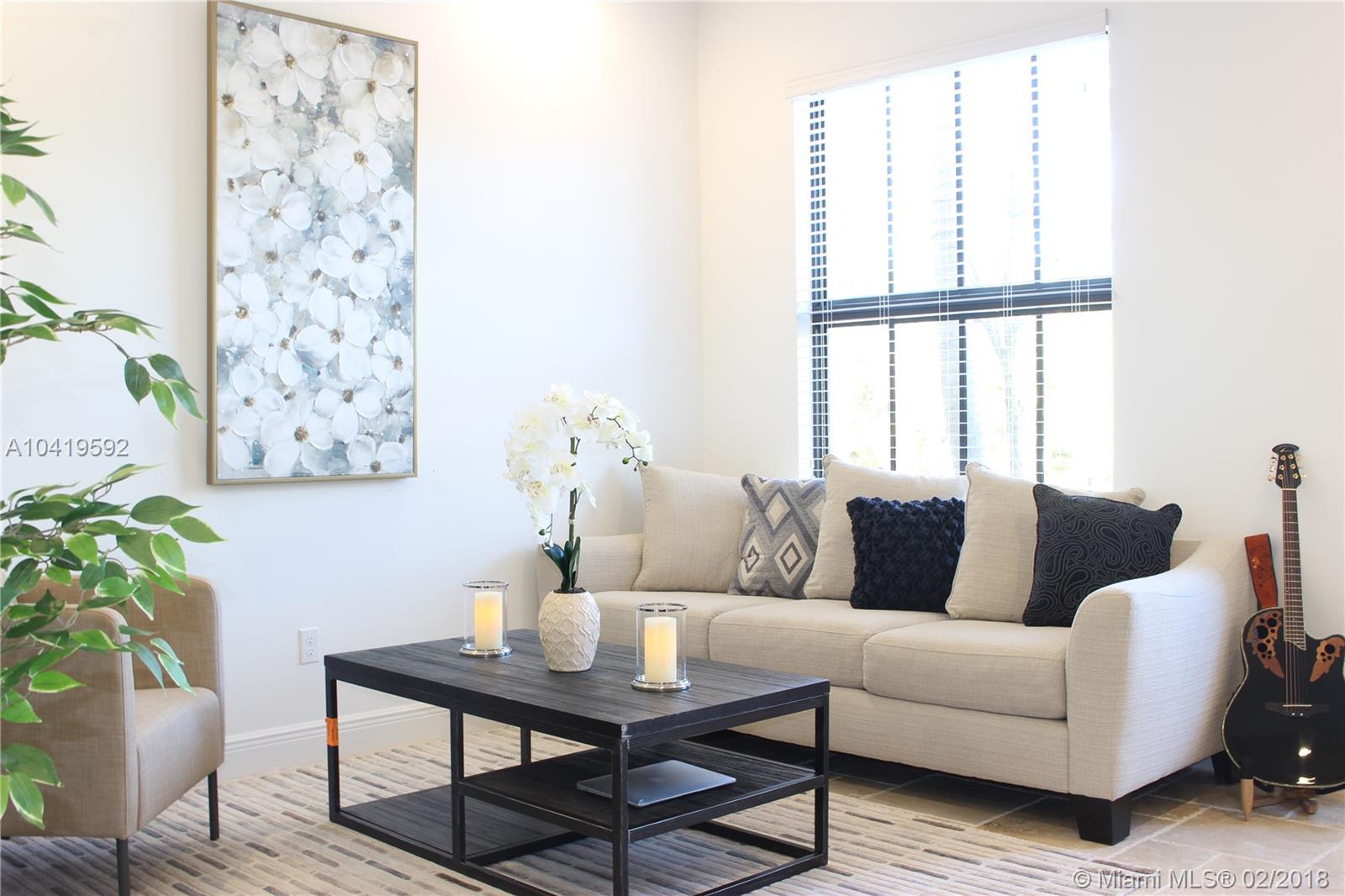 Spacious 3/2.5 open floor plan townhome in the heart of Downtown Doral. Perfect for entertaining. Ample closet and storage space. Two car garage with room for bicycles and golf clubs. Walk to school, Publix and dining. Smart layout with laundry on second floor with the bedrooms. Light and bright unit. Market priced.