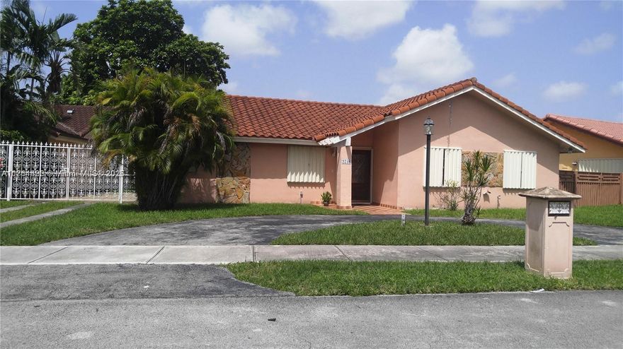 Spacious home featuring 3 bedrooms and 2 bathrooms in highly desired area. Nice, open floor plan. Formal living and dining rooms. Large kitchen with snack counter that opens to the family room. En-suite master has walk-in closet and sliding doors that lead to the patio. Covered terrace and fenced yard with room for a pool. Accordion shutters throughout. Centrally located near shopping, schools, restaurants, highways and more.