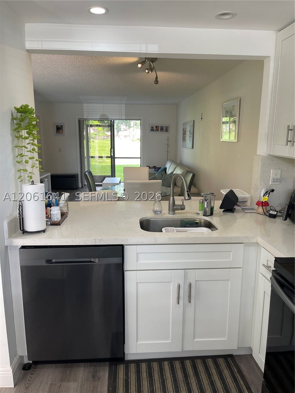 Photo of 10434 Sunrise Lakes Blvd #107, Sunrise, FL 33322 (MLS # A12061641)