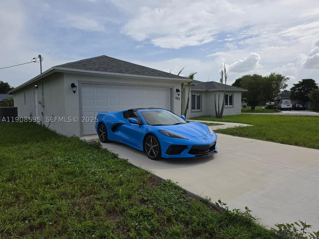 Photo of 482 NW Marion Ave, Port St Lucie, FL 34983 (MLS # A11908595)