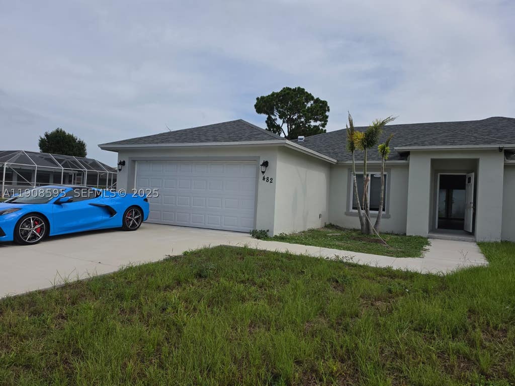 Photo of 482 NW Marion Ave, Port St Lucie, FL 34983 (MLS # A11908595)