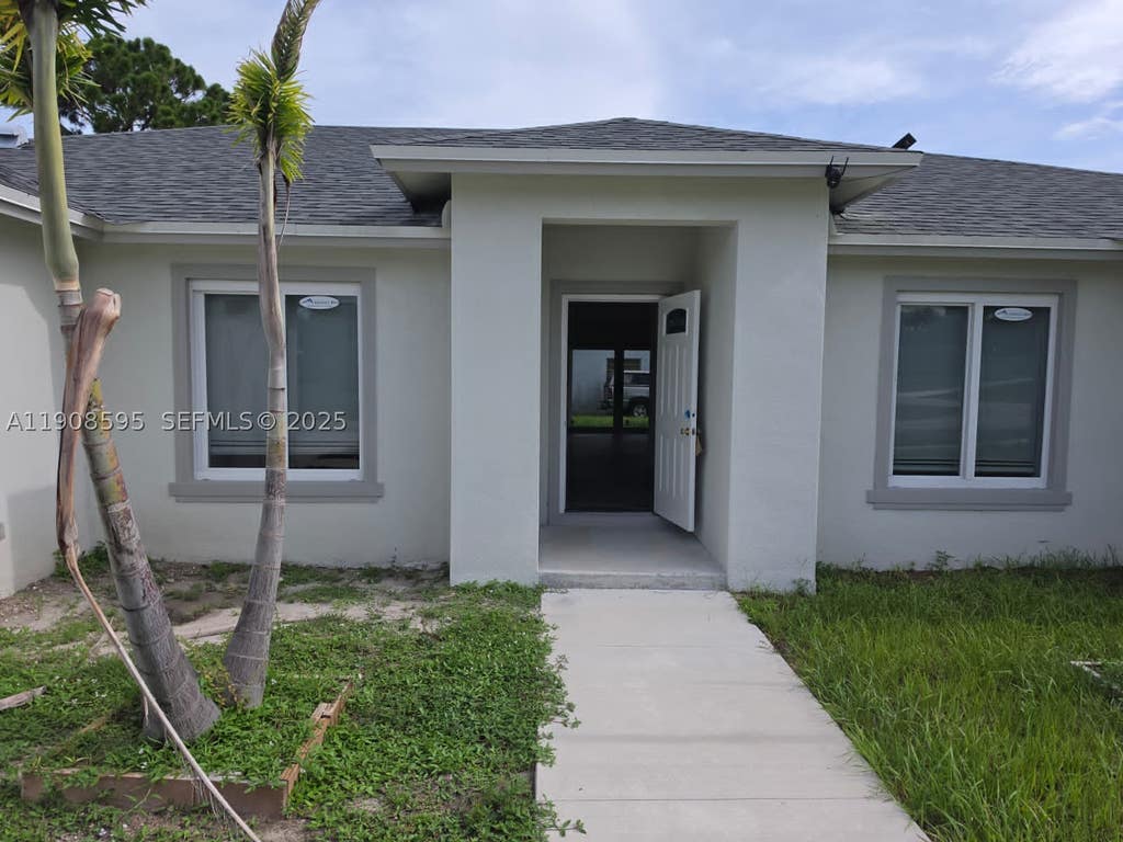 Photo of 482 NW Marion Ave, Port St Lucie, FL 34983 (MLS # A11908595)