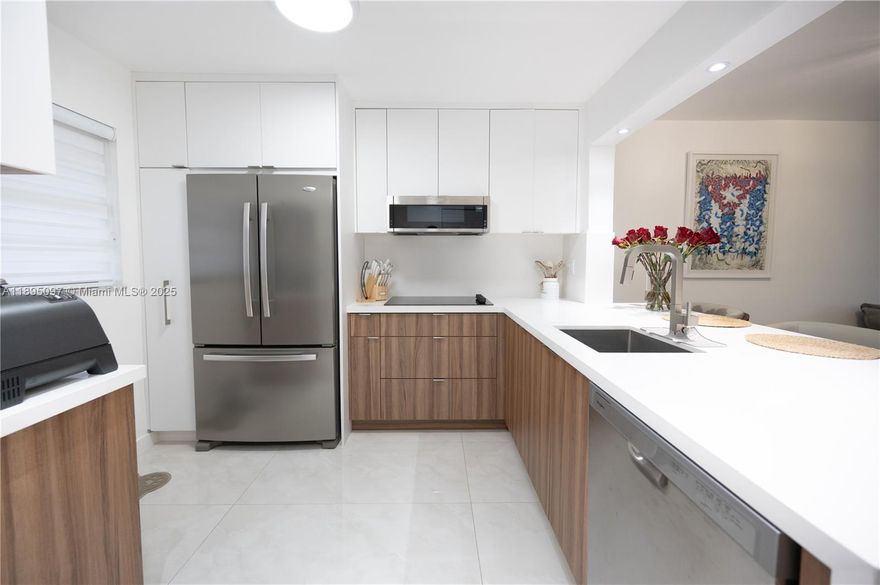 Beautifully upgraded 2bed/2-bath condo on the second floor in the desirable Gardens of Kendall South community. This home has been fully remodeled throughout, featuring elegant ceramic tile floors, completely renovated bathrooms, a modern kitchen, and an in-unit washer and dryer for ultimate convenience. Enjoy a bright, open layout, one assigned parking space, and plenty of guest parking. Small pets are welcome (1 pet up to 10 lbs). The community offers excellent amenities, including a swimming pool and tennis courts. Prime location near Miami Dade College, major highways, shopping, and dining. Perfect combination of comfort, style, and convenience. Available for move-in on December 1st, schedule your showing today!