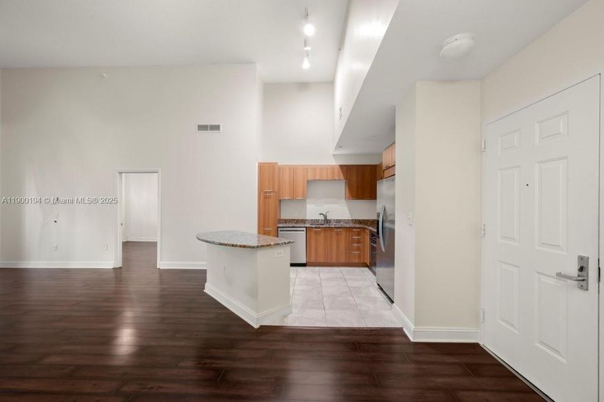 Extremely rare first-floor poolside unit with soaring 14’ ceilings at The Veranda Condominium in Plantation. Includes water, internet, cable TV, and two assigned parking spaces in the gated garage. Just a five-minute walk to a serene lake or the nearby village center with coffee shops, grocery, banks, and restaurants. Features granite countertops, stainless steel appliances, European cabinetry, marble shower and soaking tub, washer and dryer, and smart key FOB entry. Enjoy resort-style amenities including a tropical pool and jacuzzi, fitness center, sauna, 24-hour concierge, and high-tech security.