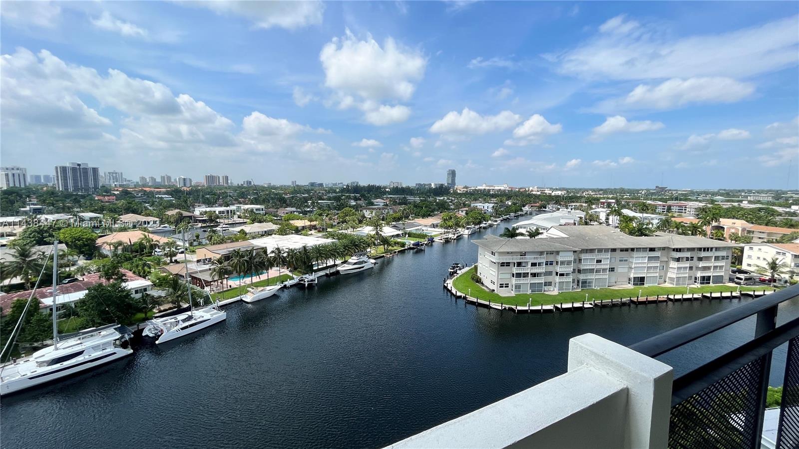 Water and City View 2 bedroom, 2 bath ready to move in condo featuring stunning canal, city and ocean views with a large wraparound balcony, hardwood floors in living/dining/bedrooms and tile floors in bathrooms. Stainless Steel kitchen appliances, hurricane impact windows. Lots of closet space. French doors and oversized bathtub in master bathroom. A/C and Hot Water are included in HOA. Just a short walk to the beach, shopping malls and restaurants. Less than a 5 minute drive to the casinos, the Gulfstream Racetrack and Margaritaville.