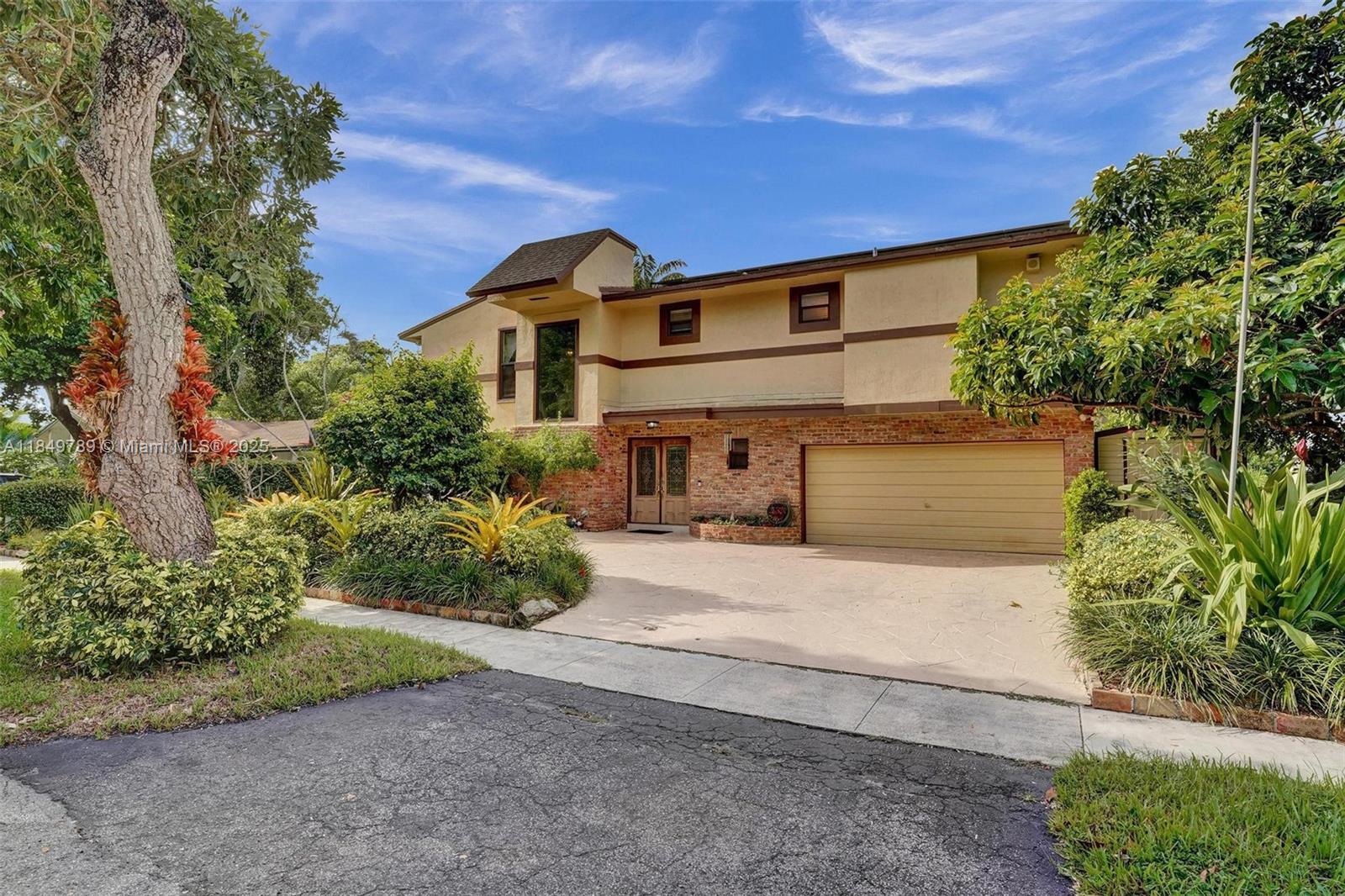 OPEN HOUSE SATURDAY FROM 12-2PM! Welcome to your dream home in the heart of Cooper City! This stunning 4-bedroom, 2 full bath & 2 half bath waterfront pool home offers the perfect blend of luxury, comfort & functionality. Nestled in one of South Florida’s most sought-after cities and located within a top school district, this 2-story gem is a true must-see! The screened-in pool and patio area is surrounded by lush landscaping and a variety of fruit trees, creating your own private oasis. Enjoy Florida living at its finest with a spacious patio ideal for relaxing or hosting guests. Circular driveway, some impact windows, Roof (2018); Solar Panels (2019) two A/C Units; EV Charger, huge Shed!. $31 per month to City for canal maintenance.