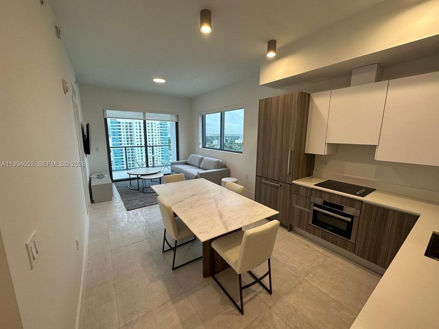 1 Bed / 1 Bath residence in the desirable Smart Condo. This unit features a modern open layout, floor-to-ceiling windows, and abundant natural light. The kitchen is equipped with sleek cabinetry, stainless steel appliances, and stone countertops. Spacious bedroom with ample closet space and a well-appointed bathroom. Enjoy resort-style amenities including pool, fitness center, and 24-hour concierge. Conveniently located near major highways, shopping, dining, and entertainment. Ideal for comfortable and connected living.