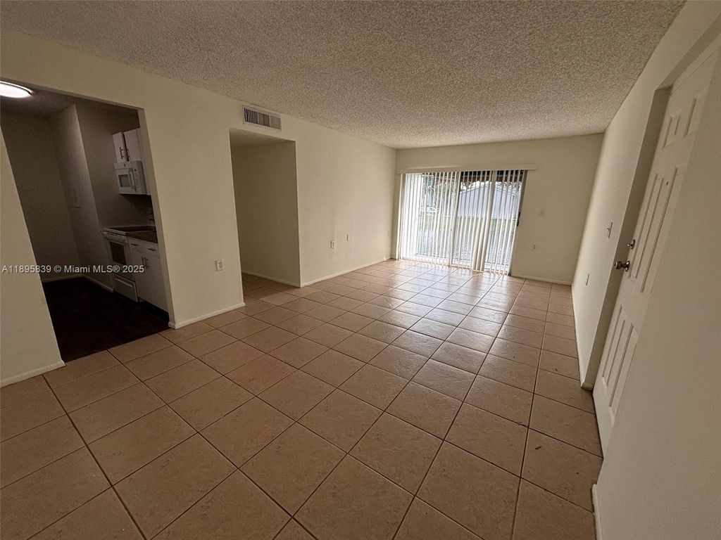 Photo of 1140 Lake Victoria Dr #F, West Palm Beach, FL 33411 (MLS # A11895839)