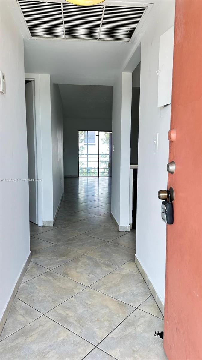 Bright and spacious 2-bedroom unit featuring an open layout, large windows, and plenty of natural light. Enjoy a modern kitchen with ample cabinet space, comfortable living and dining areas, and generously sized bedrooms with good closet storage. The property includes central A/C, tile flooring, and a private balcony. Located in a gated community with convenient access to shopping, dining, and major highways. Laundry is in the unit. Fast approval—ready for immediate move-in!