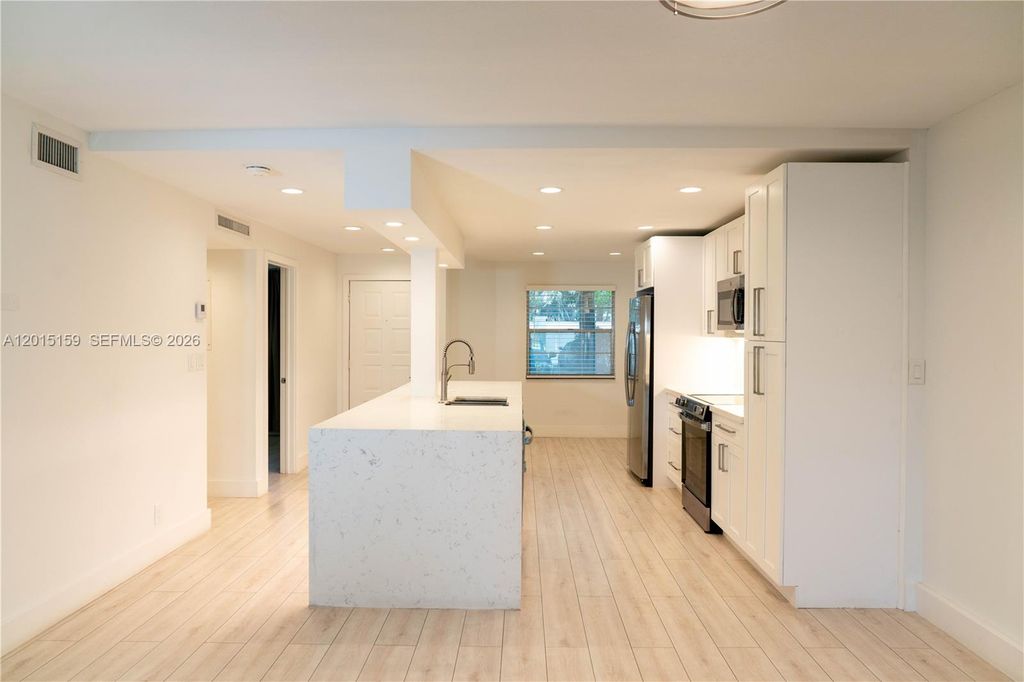 Photo of 1604 Abaco Dr #F1, Coconut Creek, FL 33066 (MLS # A12015159)
