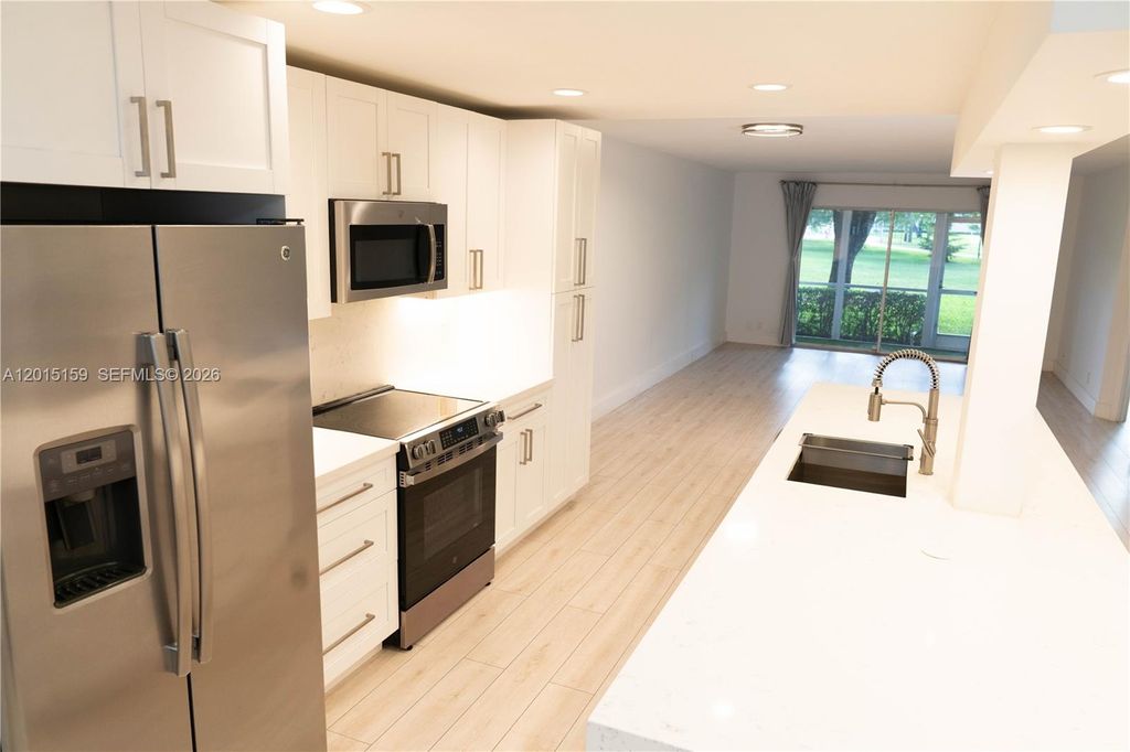 Photo of 1604 Abaco Dr #F1, Coconut Creek, FL 33066 (MLS # A12015159)