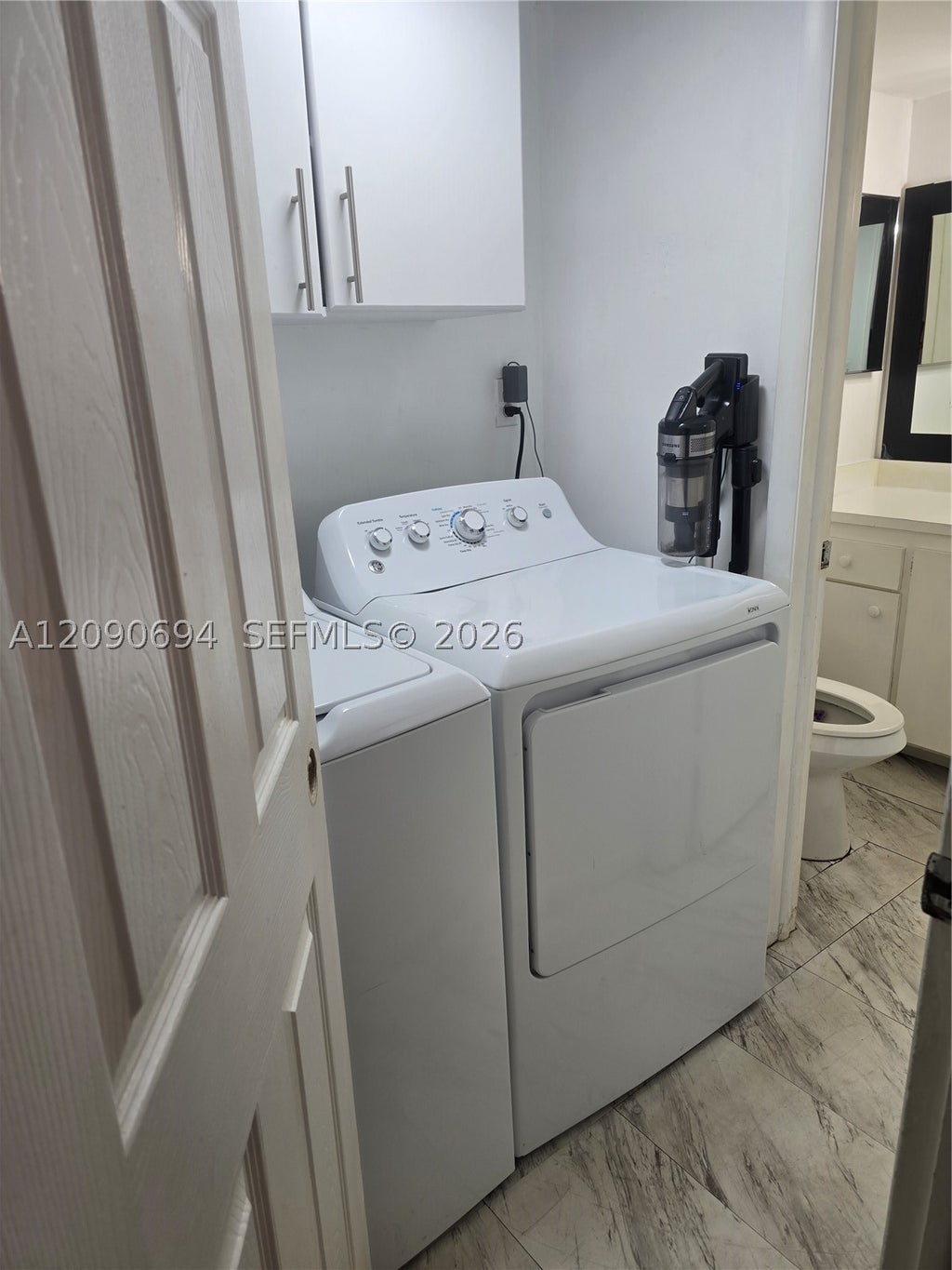 Photo of 2185 White Pine Cir #B, Green Acres, FL 33415 (MLS # A12090694)