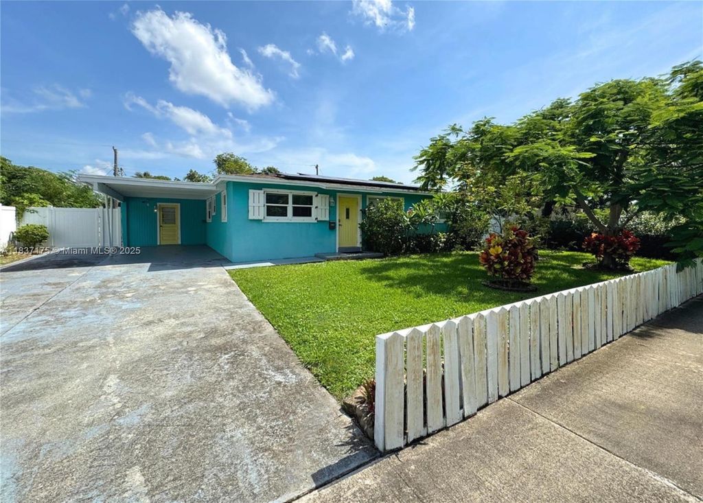 Photo of 813 Date Palm Dr, Lake Park, FL 33403 (MLS # A11837175)