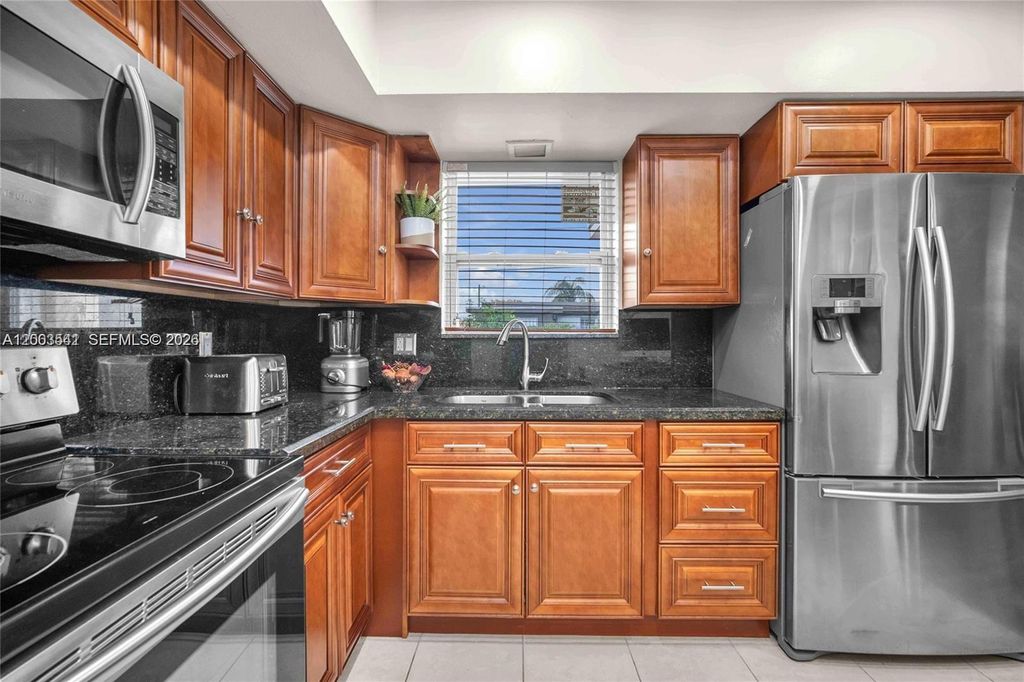 Photo of 2825 SW 5th St, Fort Lauderdale, FL 33312 (MLS # A12003541)