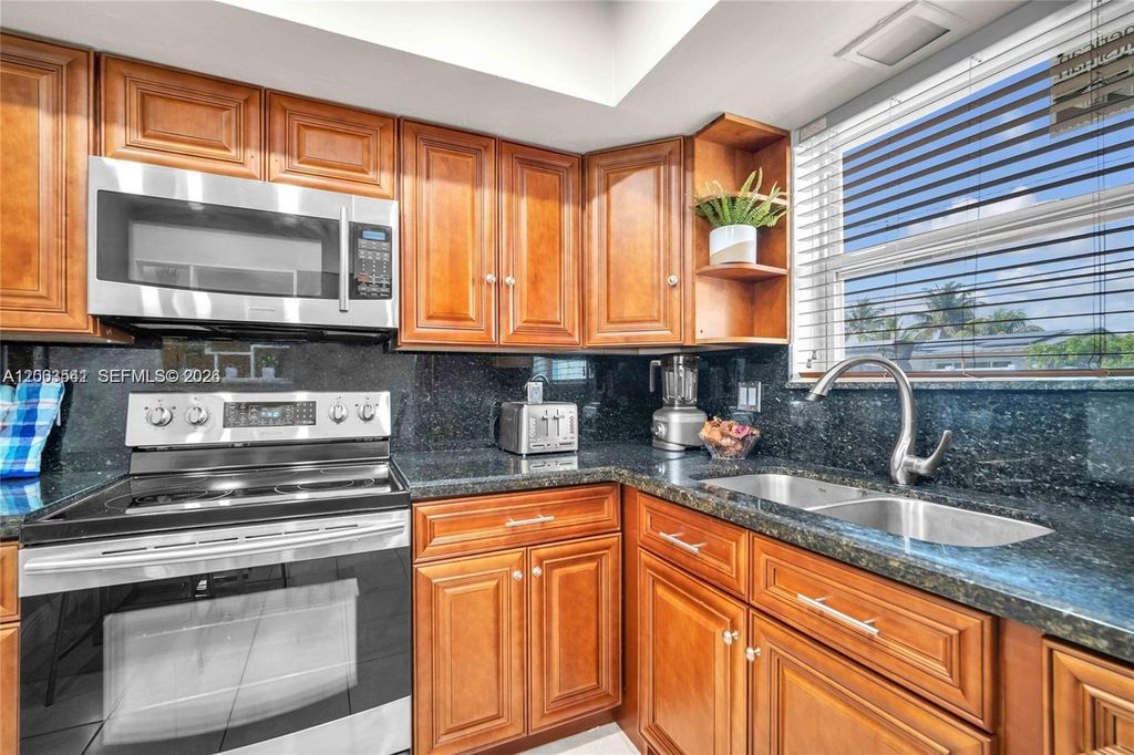 Photo of 2825 SW 5th St, Fort Lauderdale, FL 33312 (MLS # A12003541)