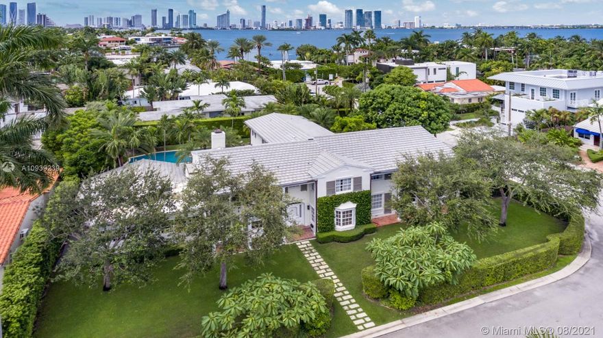 Step Inside With Me! The Hamptons embodied on the Venetian Islands! Situated on a 15,000SF corner double lot, this swanky gem offers 6,000SF of interiors curated by designer Karine Richards. Modern and classic transcend the AD-worthy living spaces. An inviting atmosphere to lounge, work, and entertain is captured in each space. The Primary Suite is outfitted with a large walk-in closet, beautiful bath and sitting area. Floor to ceiling glass allows for natural light to shine on the chef's kitchen, complete with a grand eat in island, gas range, Subzero & Miele appliances, and casual dining area. The outdoors transport you to another place in time- a cabana, glamorous pool, and gardens await. Truly in a league of its own, this significant home is on the market for the first time in 35 years