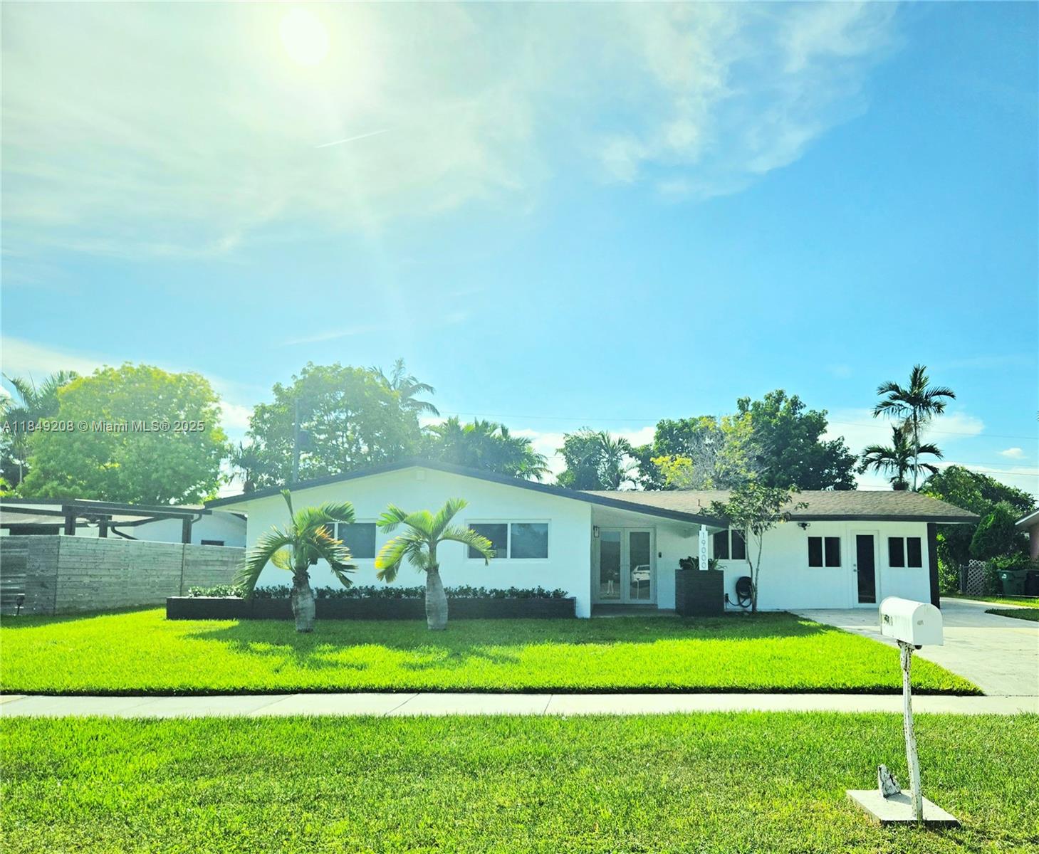 Fall in love with this beautifully remodeled 3BR/2BA home featuring white kitchen cabinets with white Quartz , SS appliances, gas stove, and W&D. Vinyl and ceramic tile flooring, impact windows/doors, his & hers closets in the primary bedroom. Open terrace, fenced pool, spacious backyard perfect for entertaining, plus an enclosed carport withmulti-purpose room. Move-in ready!