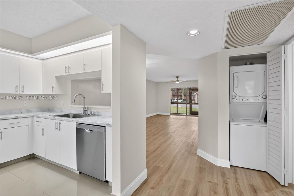 Photo of 701 SW 142nd Ave #113S, Pembroke Pines, FL 33027 (MLS # A11974378)