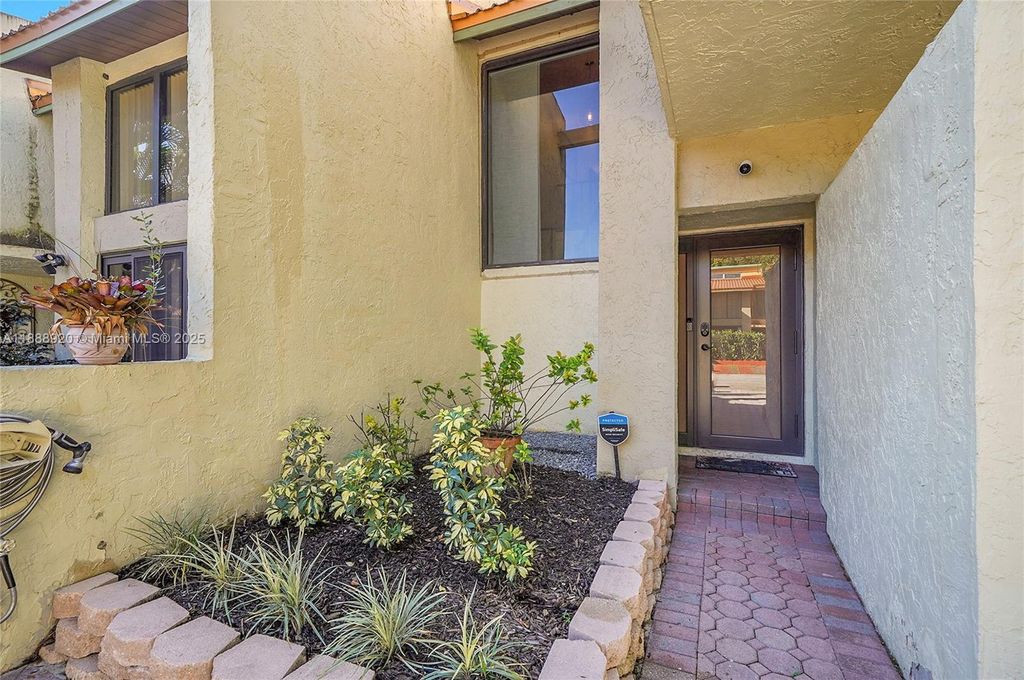 Photo of 750 E Coco Plum Cir #8, Plantation, FL 33324 (MLS # A11888920)