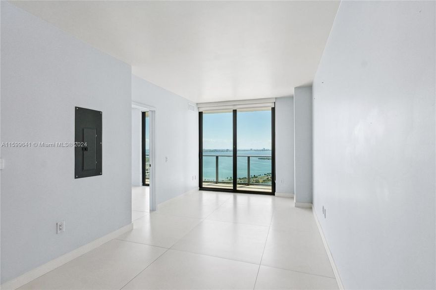 Experience sophisticated living in this 1 bed / 1.5 bath plus den, featuring breathtaking water views from every room. Unit is spacious and bright. Enjoy Bosch appliances, a GE washer and dryer, dual-door shower, and dual sinks in the master bath. Porcelain floors through out the unit. Freshly painted and never rented. 
The full-service building boasts a rooftop pool on the 46th floor, a second pool on the 5th, a spa, sauna, state-of-the-art gym, kids room, and a social room with billiards and projection TV. On-site management, valet service, and one assigned parking space included.