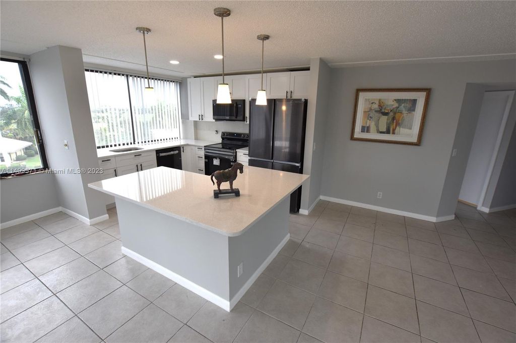 Photo of 1500 Presidential Way #401, West Palm Beach, FL 33401 (MLS # A11499571)