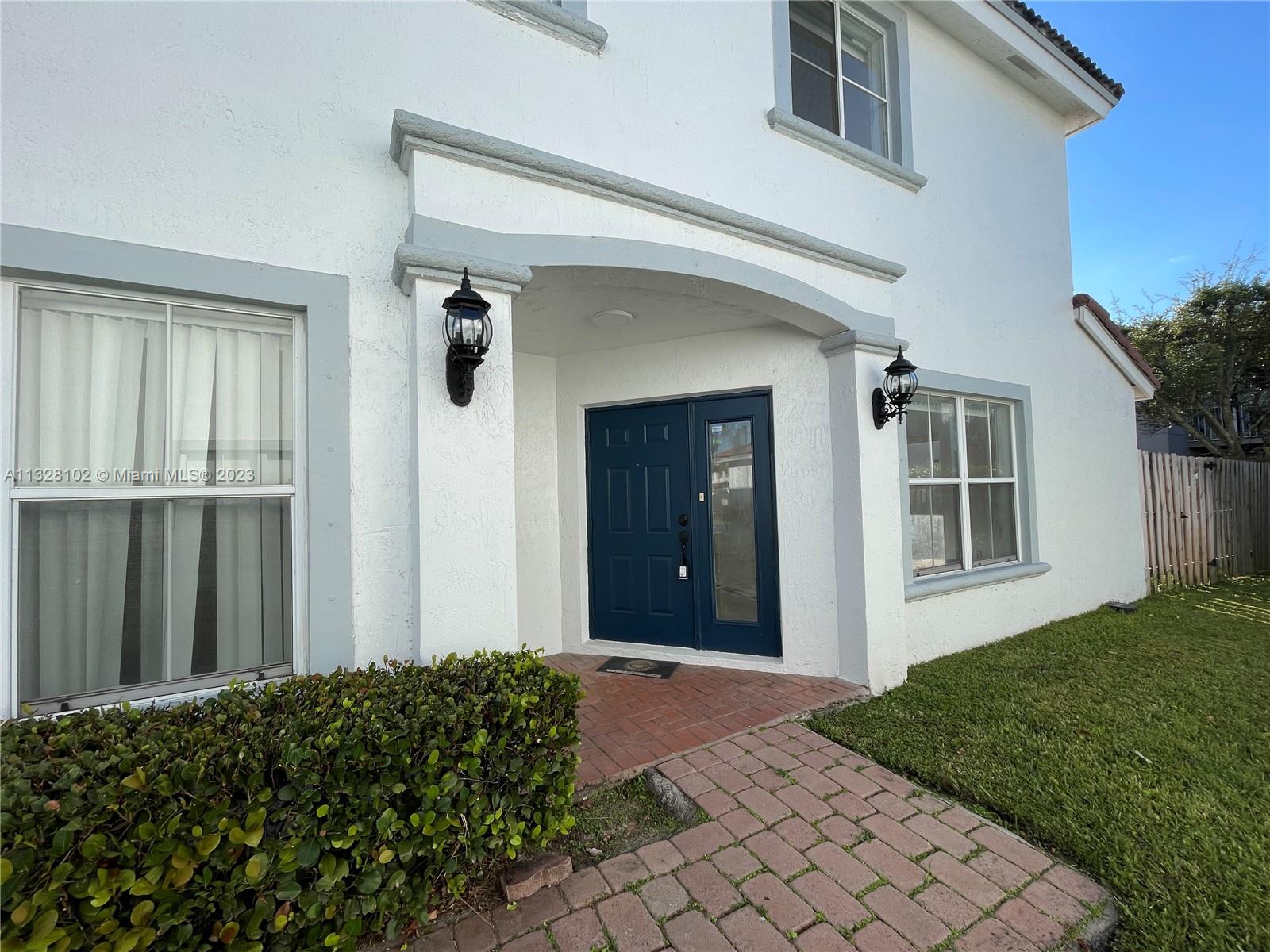 3/2.5 Dimensions At Doral Community, corner unit, lake view of a water fountain, Tile downstairs, new vinyl floor on stairs and upstairs, All NEW stainless steel appliances, All freshly painted, more than 1700 SF includes kitchen nook, dining room and upstairs open space. One car garage and large back yard, enclosed with wood fence. Gated with 24 hours virtual guard, this small well managed community is next to a trail / dog park and close to turnpike and HW 826,ready to welcome your family to move in