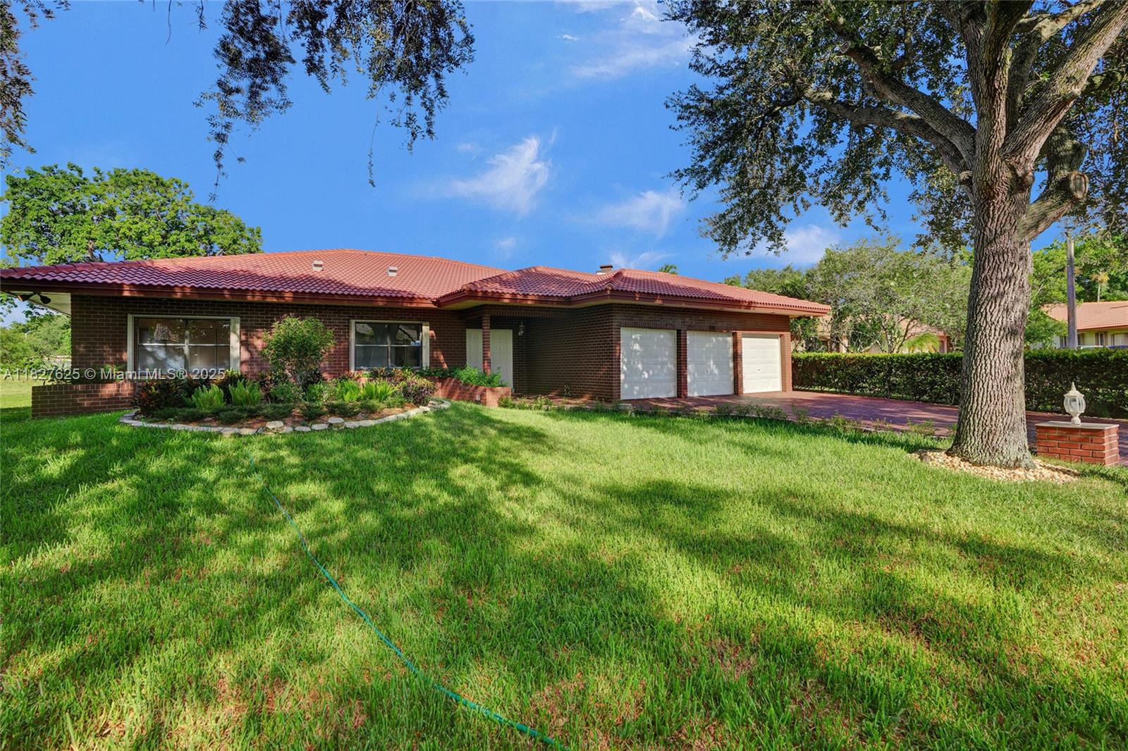 Discover this stunning 4-bed, 2-bath single-family home at 119 NW?81st Way in Coral Springs’ desirable Shadow Wood community. This spacious 3,035 sq?ft residence sits on a generous 0.27-acre lot with serene canal views. Featuring vaulted ceilings, elegant wood and tile flooring, and a split floor plan, the home offers privacy and bright living spaces. The kitchen impresses with wood cabinetry, granite countertops, and a breakfast area adjacent to a formal dining room and family room. Step outside to a screened-in patio and free-form pool overlooking a lush private yard with fruit trees and more. Interior bedrooms, living room, and utility room all open to the outdoor oasis. Close to top schools, shopping, dining, and major highways.